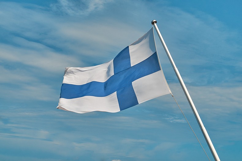 Finland Flag Against Blue Sky