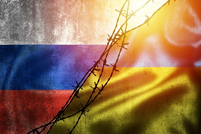 Flags of Russia and Ukraine with Barbed Wire