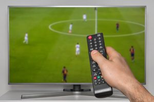 Football Match on TV Screen