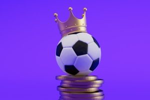 Football Wearing Crown on Top of Coin Stack