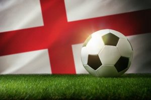 Football on Grass Against England Flag