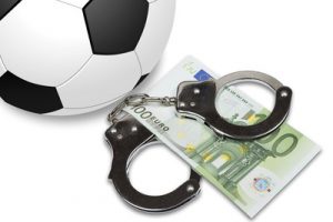 Football with Handcuffs and Euro Banknotes