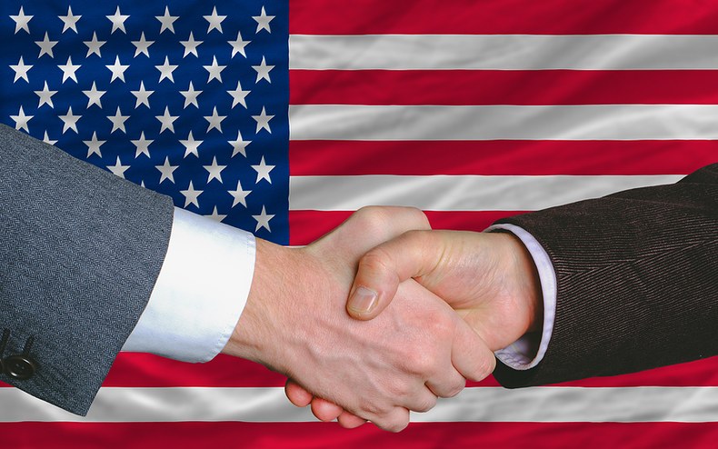 Handshake Against USA Flag