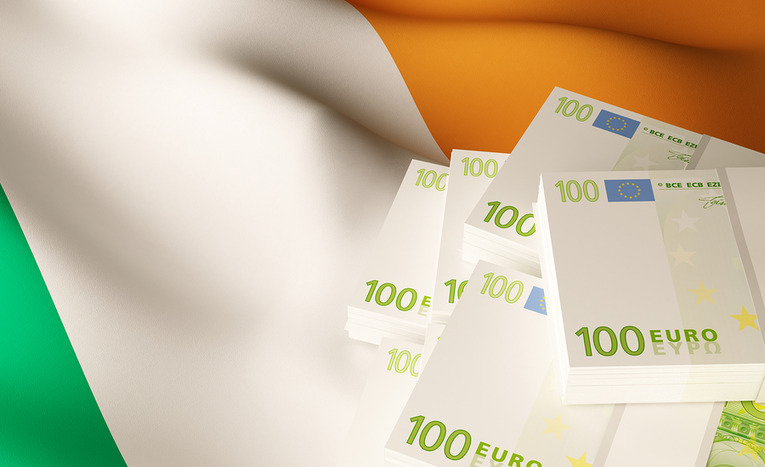 Ireland Flag and 100 Euro Banknotes