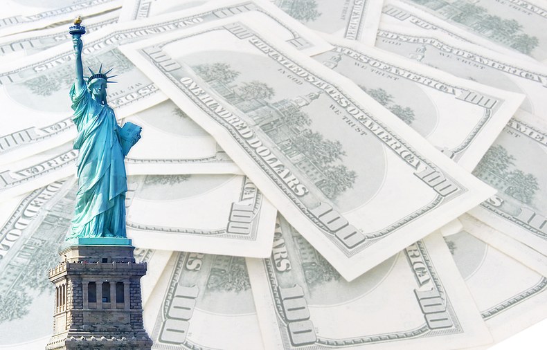 Statue of Liberty Against 100 Dollar Banknotes