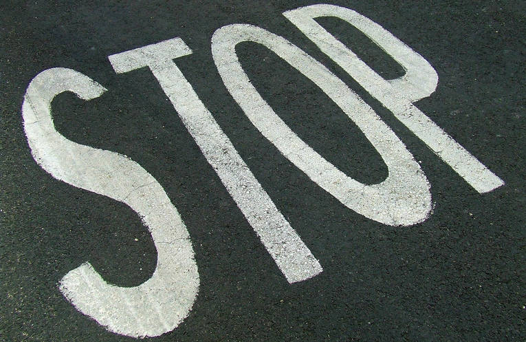 Stop Sign Painted on Road