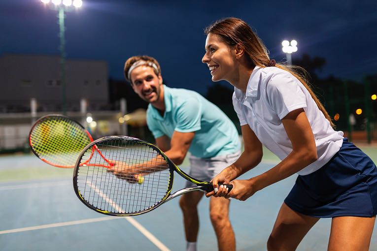 Man & woman in tennis